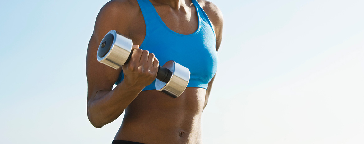 Woman using weights